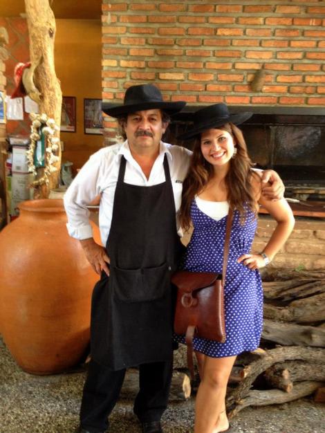 The owner of the parilla place wanted me to take a picture with him.