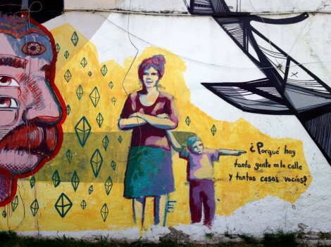 My favorite street art in La Boca. It translates like, "why are there so many people in the street when there are so many vacant houses?"