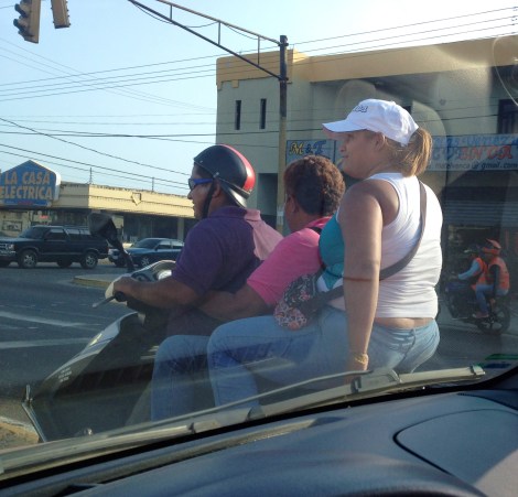 You can't forget the motorcycles full of people winding in and out of the cars too!