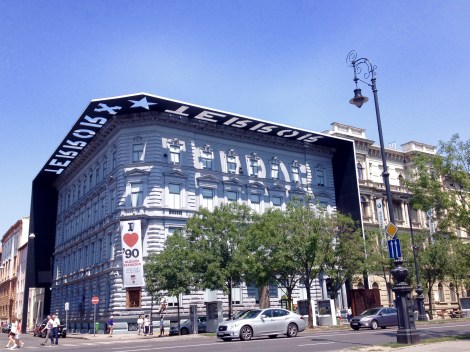Notice that the cutout on the roof creates the word "terror" on the building