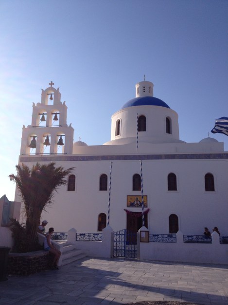 Church as the sun goes down in Oia