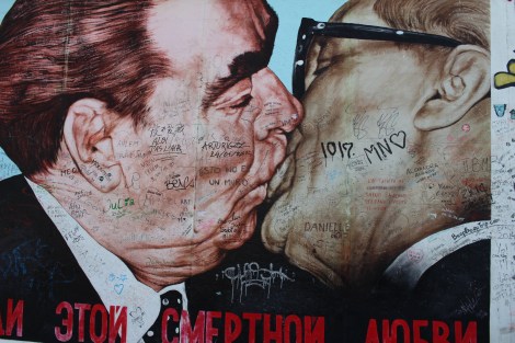 The Kiss depicts Soviet leader Leonid Brezhnev giving the East Germany President Erich Honecker a passionate kiss. Beneath it says, 