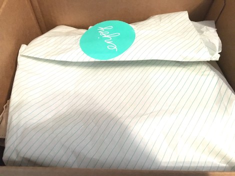 The clothes come wrapped in this pretty tissue paper